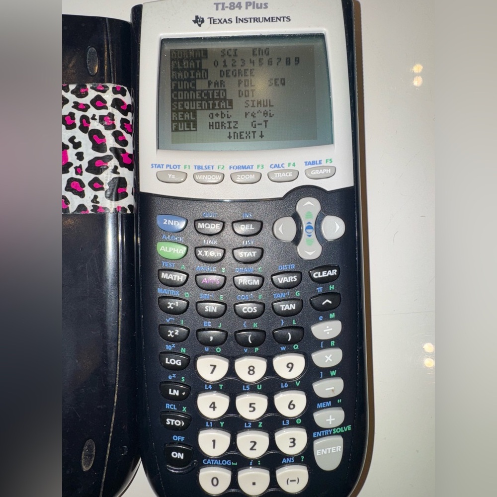 🛍️Texas Instruments TI-84 Plus Graphing Calculator - Black and Silver - Picture 9 of 13